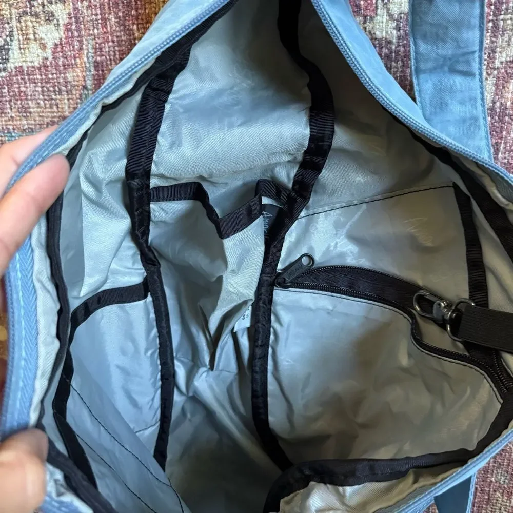 Ameribag light blue crossbody Sling Bag healthy backpack multi pocketed